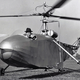 Igor Sikorsky, wearing his trademark fedora, at the controls of the VS-300. The VS-300 formed the basis for the V-316 and R-4. (Sikorsky Archives)